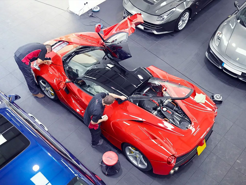 Machine paint correction on red paint